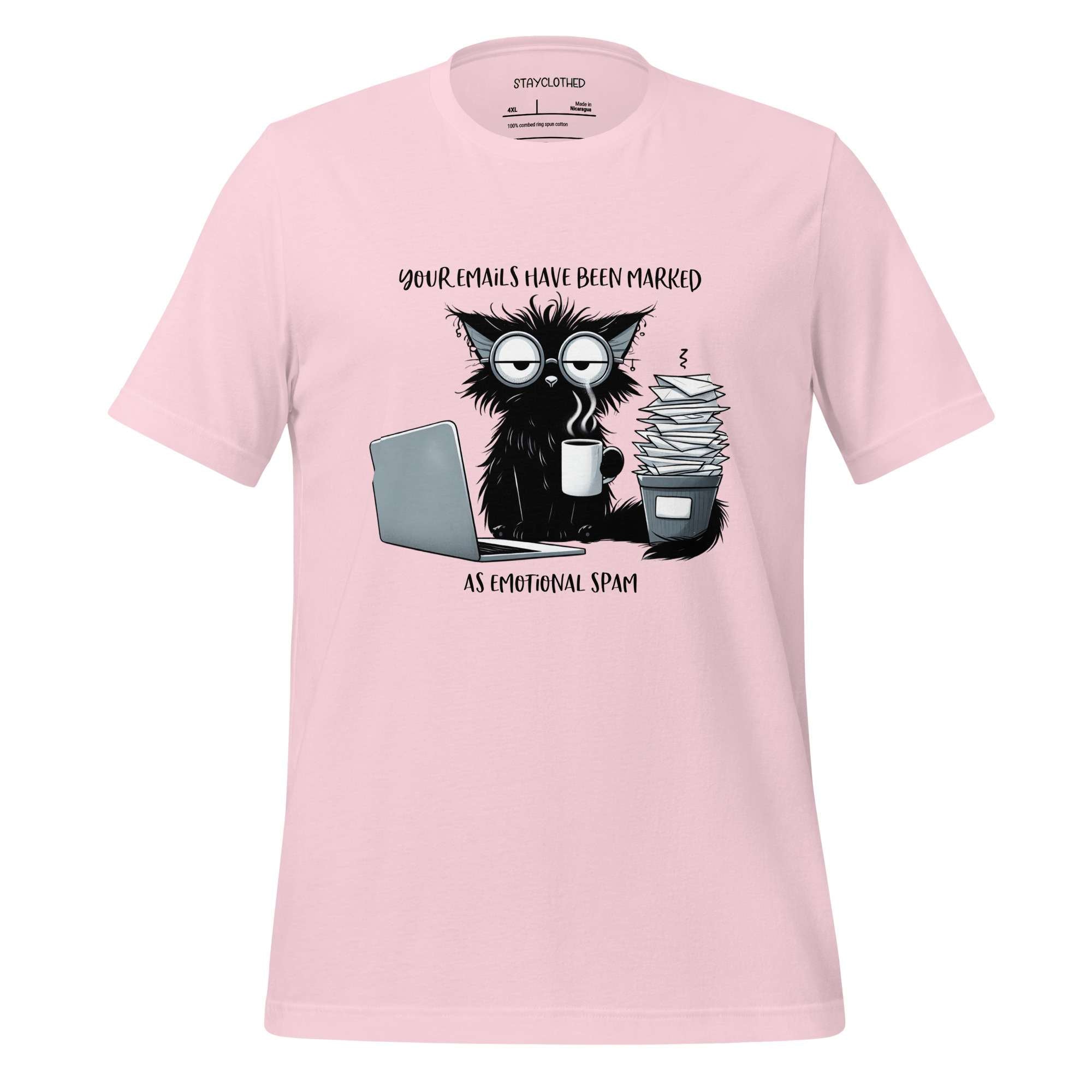Pink t-shirt with a graphic of a cat and coffee cup on a wooden surface, featuring the brand 'StayClothed'.