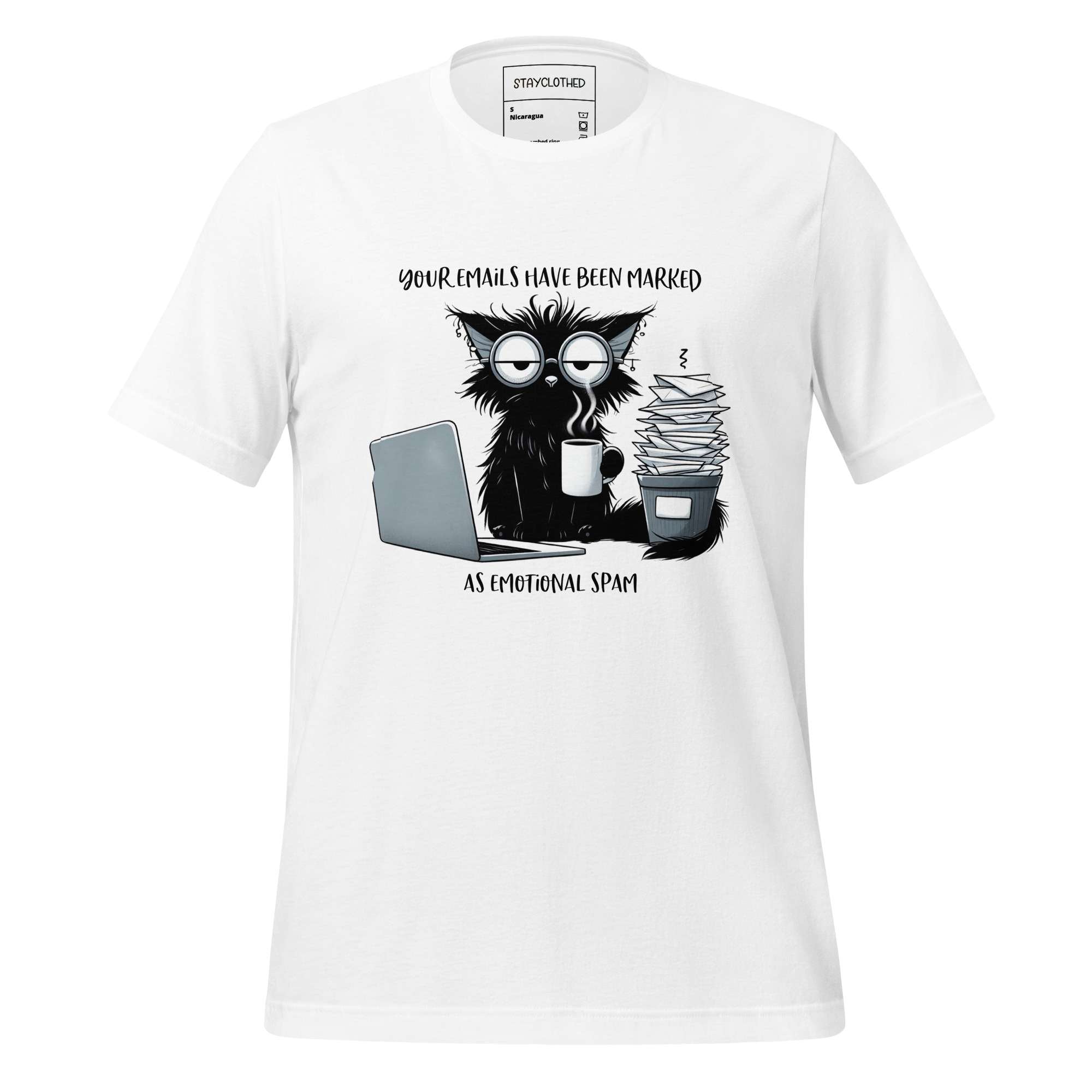 White t-shirt with black and white graphic design on a wooden surface, featuring the brand 'StayClothed'.