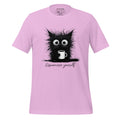 Pink t-shirt with a black cat graphic and 'StayClothed' branding on a wooden surface.
