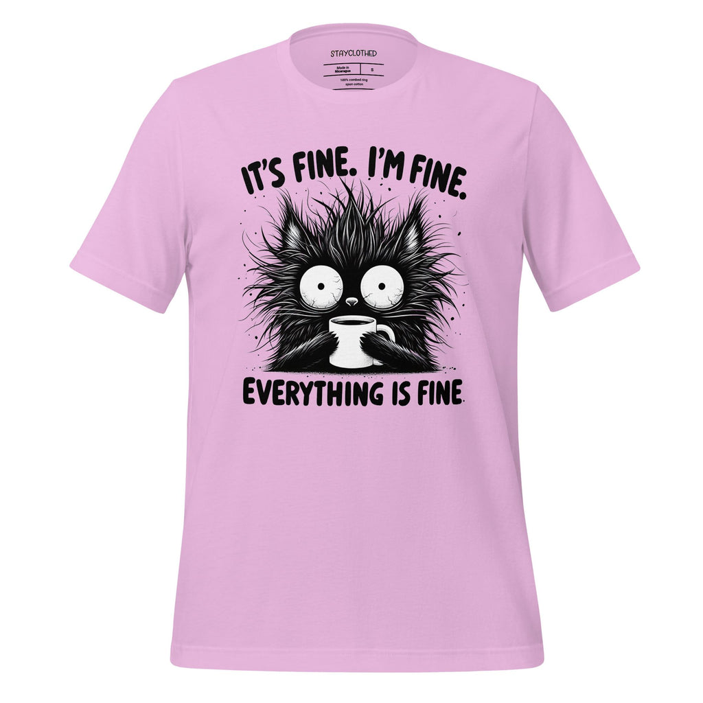 Pink t-shirt with a black cat graphic and text on a wooden surface, featuring the brand 'StayClothed'.