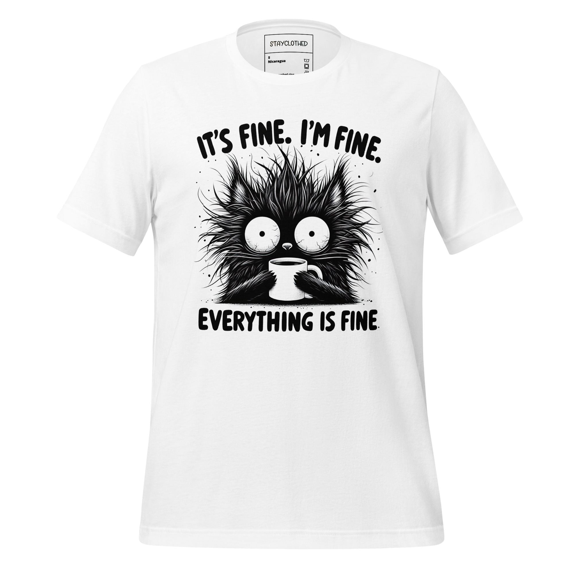 White t-shirt with a black and white graphic and text on a wooden surface, featuring the brand 'StayClothed'.