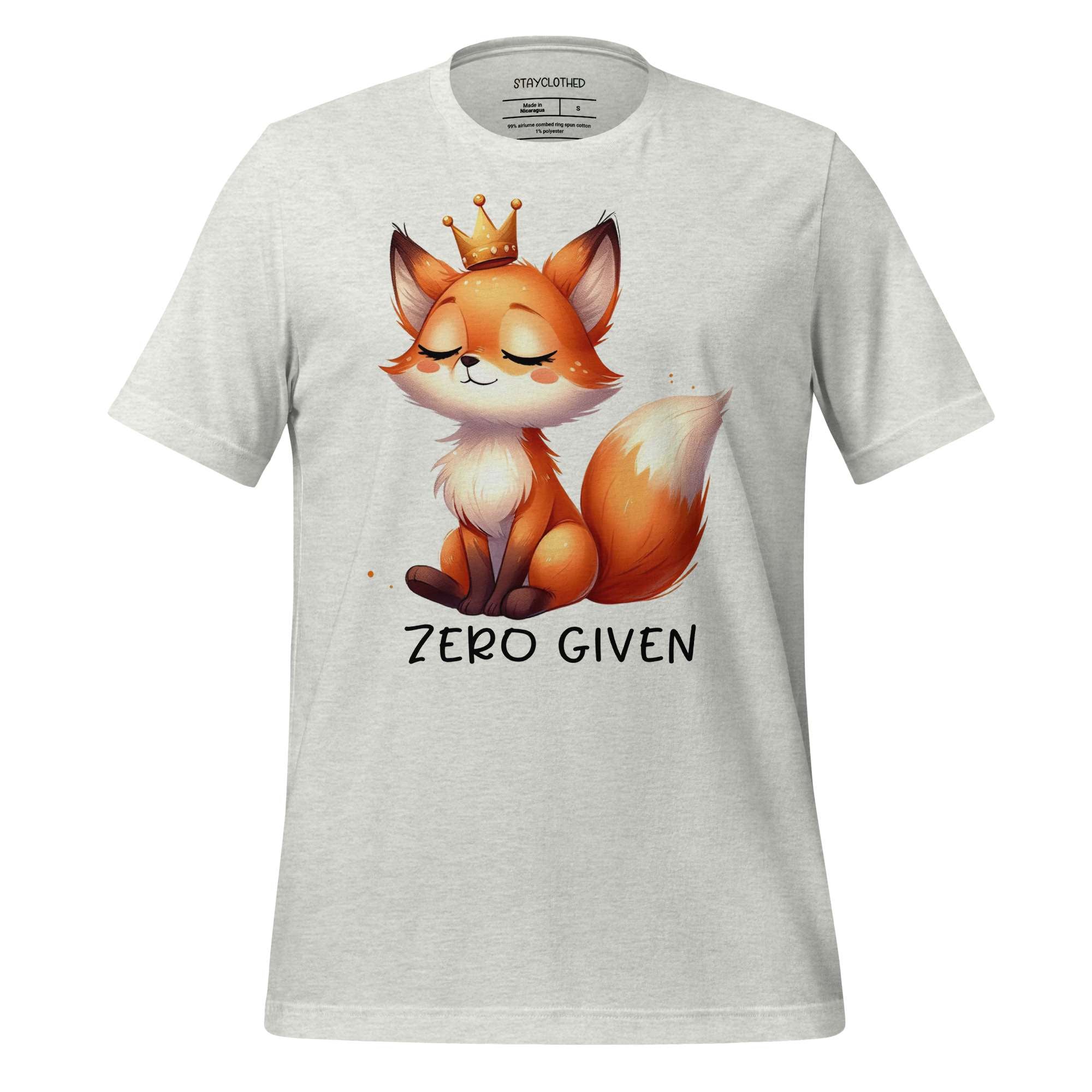 White t-shirt with a fox graphic and 'Zero Given' text on a wooden surface, branded 'StayClothed'.