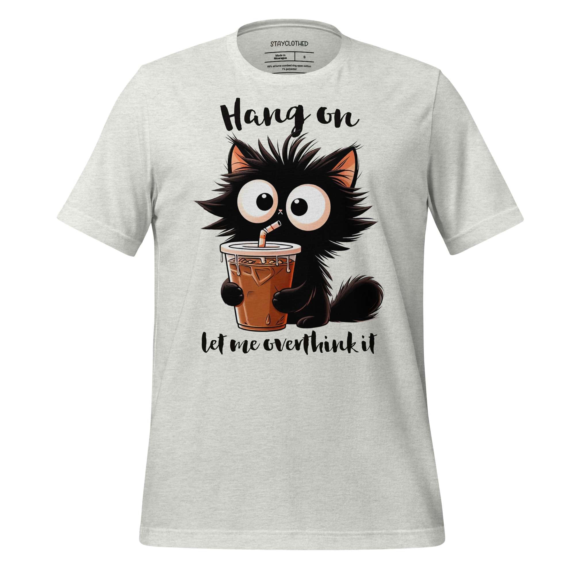 White t-shirt with a cartoon cat holding a drink on a wooden background