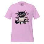 Pink t-shirt with a cat graphic and text on a wooden surface, featuring the brand 'StayClothed'.