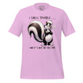Pink t-shirt with a cartoon skunk design and text on a wooden surface, featuring the brand 'StayClothed'.