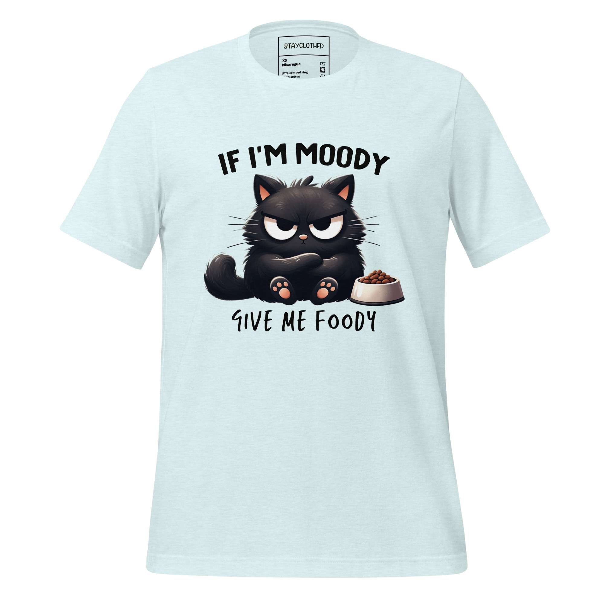 White t-shirt with a black cat graphic and text on a wooden surface, featuring the brand 'StayClothed'.