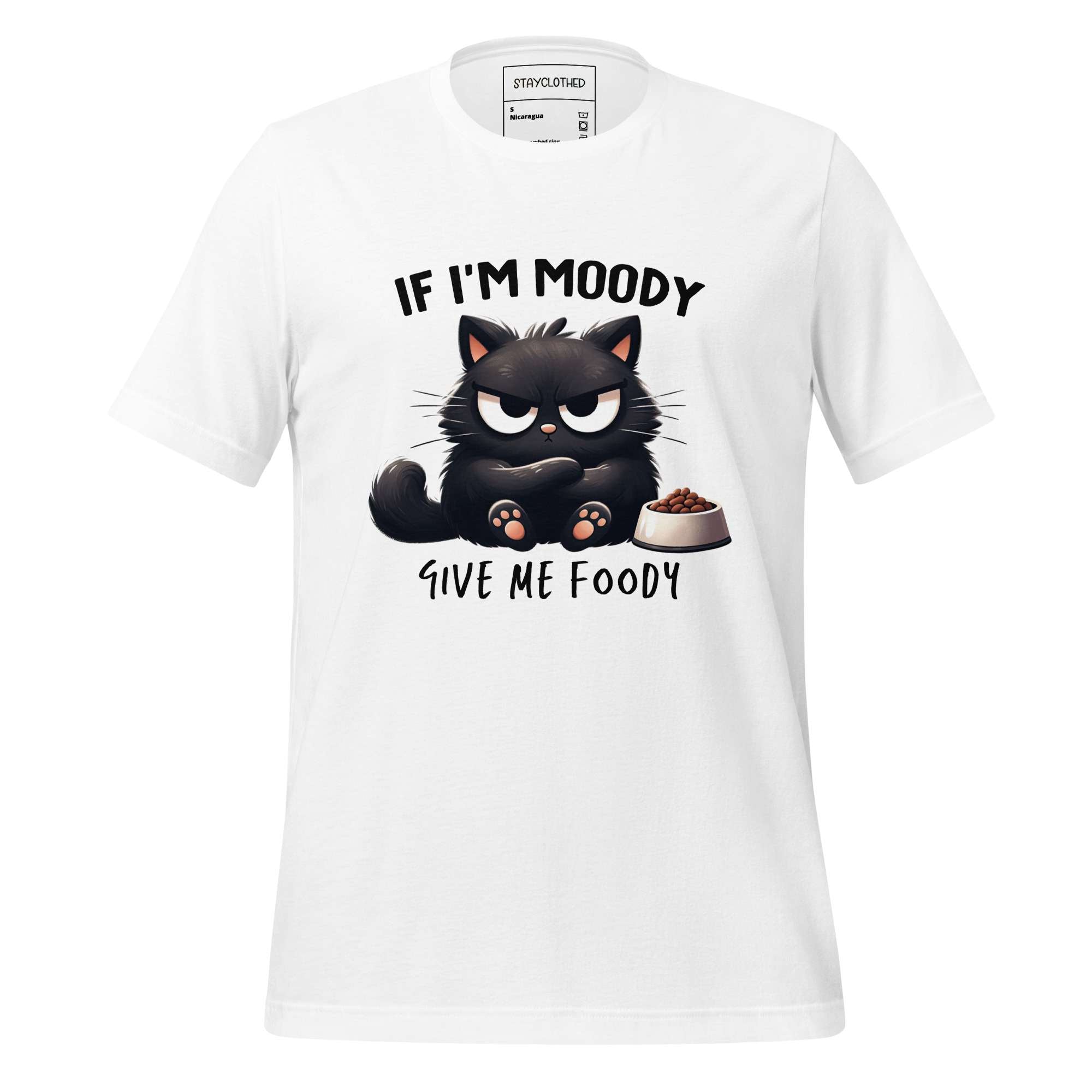 White t-shirt with a black cat graphic and text on a wooden surface, featuring the brand 'StayClothed'.
