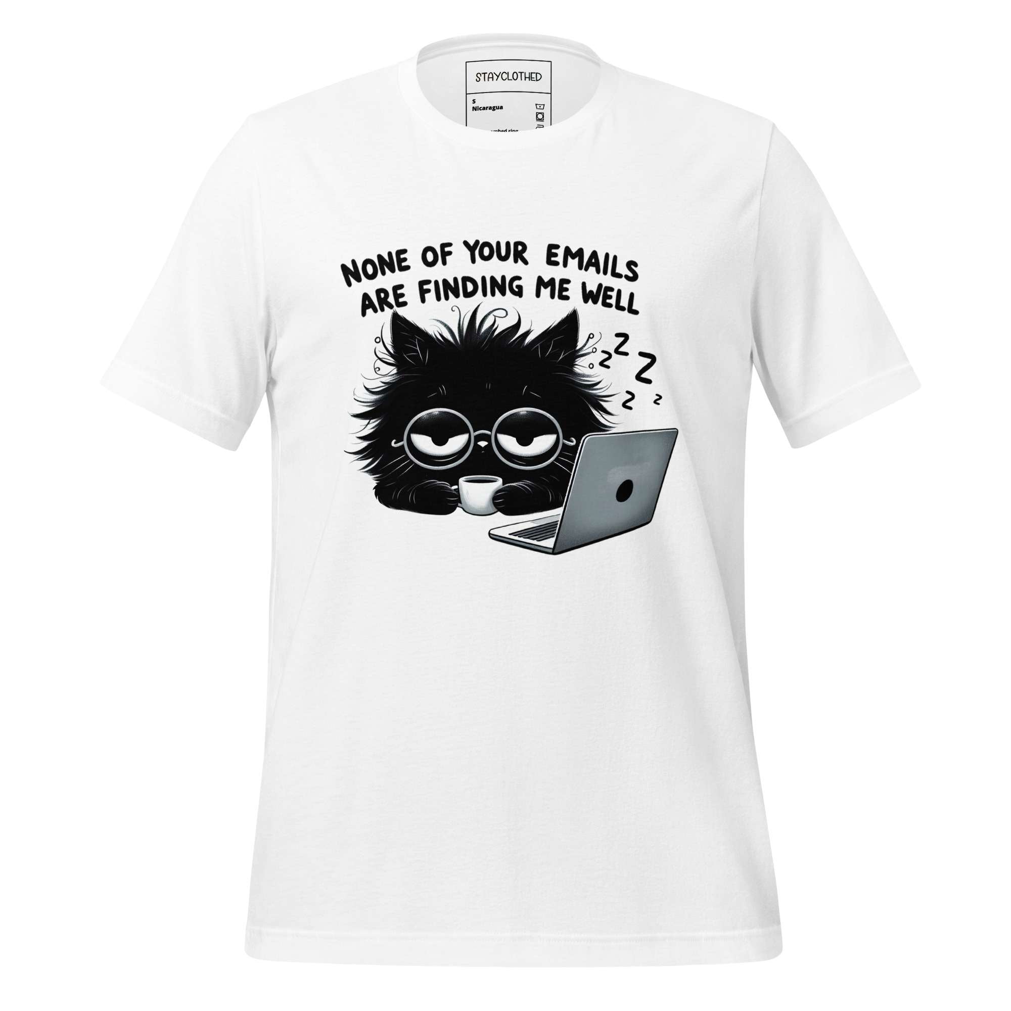 White t-shirt with a black cat graphic and text on a wooden surface, featuring the brand 'StayClothed'.