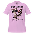 Pink t-shirt with a raccoon graphic and text on a wooden surface, featuring the brand 'StayClothed'.