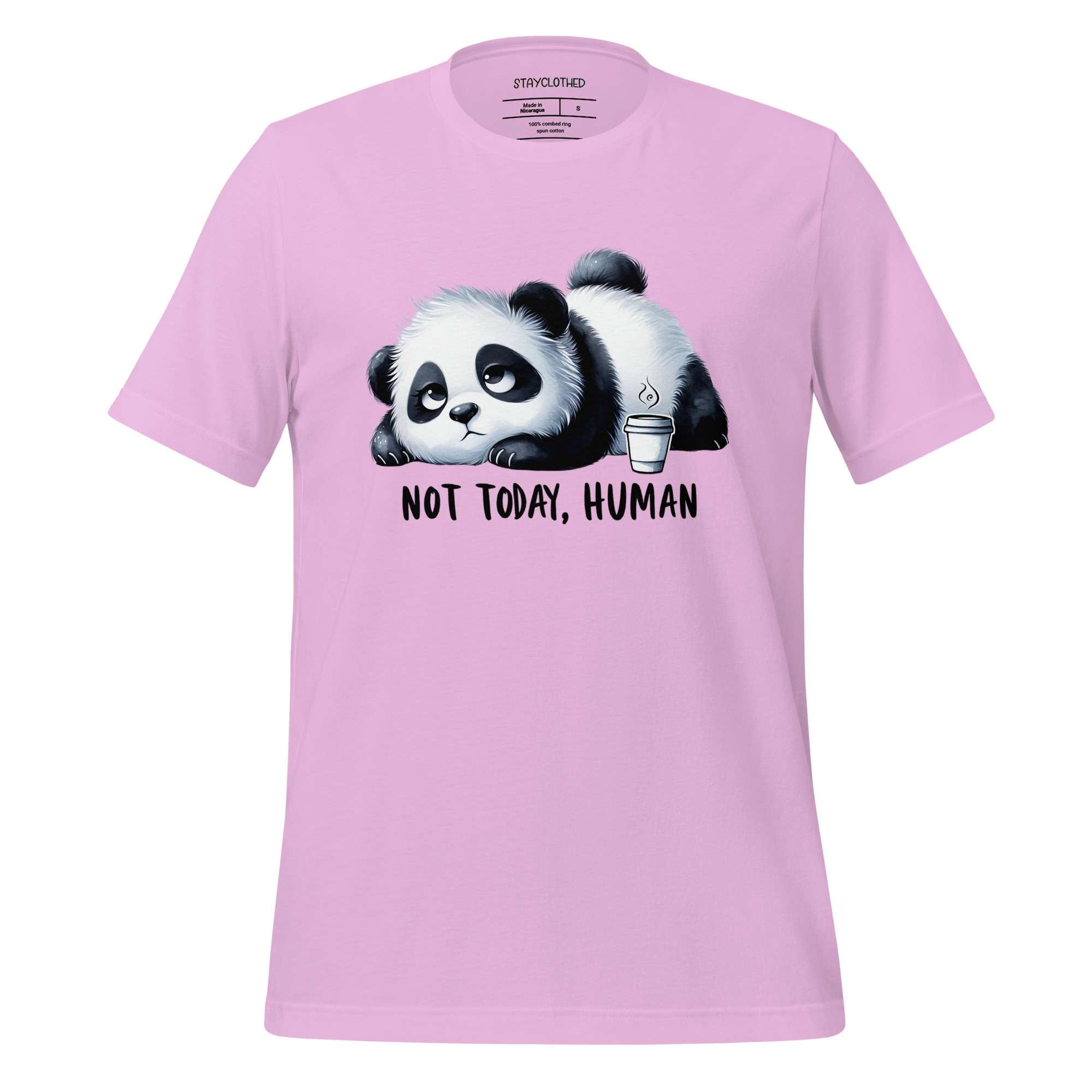Pink t-shirt with a panda graphic and 'Not Today, Human' text on a wooden surface, branded 'StayClothed'.