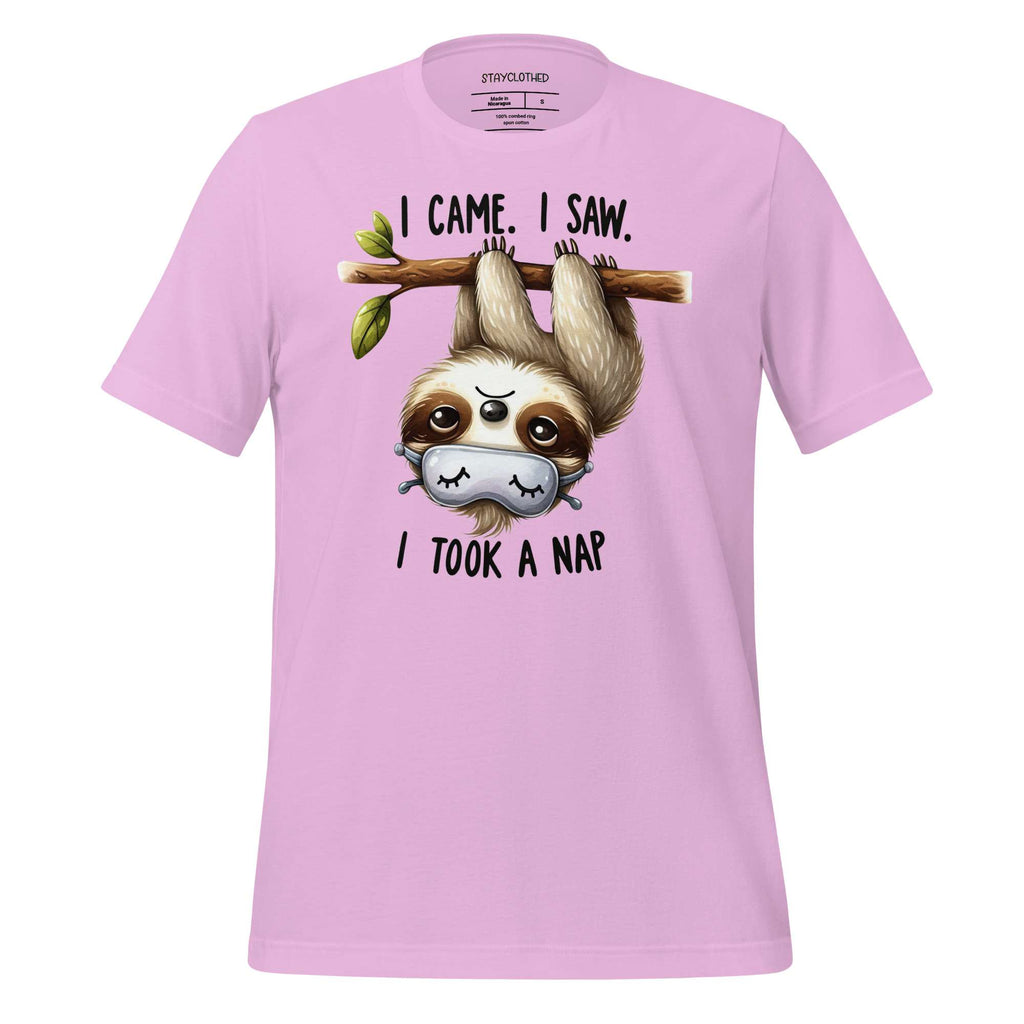 Pink t-shirt with a sloth graphic and text on a wooden surface, featuring the brand 'StayClothed'.