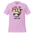 Pink t-shirt with a sloth graphic and text on a wooden surface, featuring the brand 'StayClothed'.