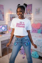 Model wearing the Internet Princess Crop Top in a pastel bedroom scene