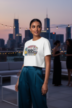 Model wearing the Made in 1995 Icon Era Crop Top on a rooftop with a city skyline