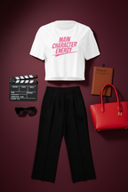 Main Character Energy Crop Top flat lay styled with black trousers and a red bag