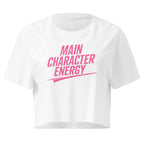 Main Character Energy white crop top front product mockup with bold pink statement text