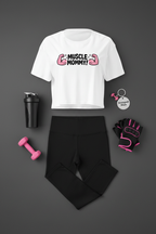Muscle Mommy Flex Crop Top flat lay styled with black leggings and gym accessories