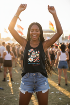 Model wearing the Tastes Like Freedom Racerback Tank Top outdoors at sunset with arms raised