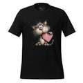 Black t-shirt with a cartoon cat holding a heart on a wooden surface, featuring the brand 'StayClothed'.