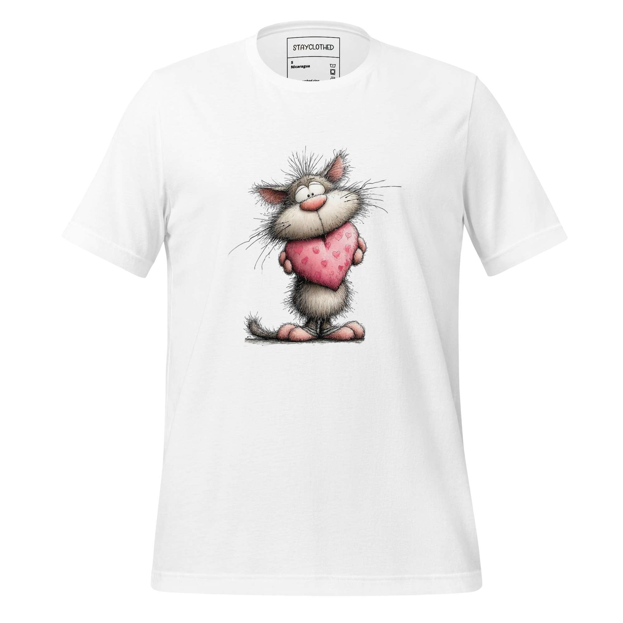 White t-shirt with cartoon cat holding a heart on a wooden surface, featuring 'StayClothed' brand.