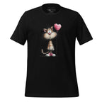 Black t-shirt with a cat holding a heart balloon design on a wooden surface, featuring the brand 'StayClothed'.