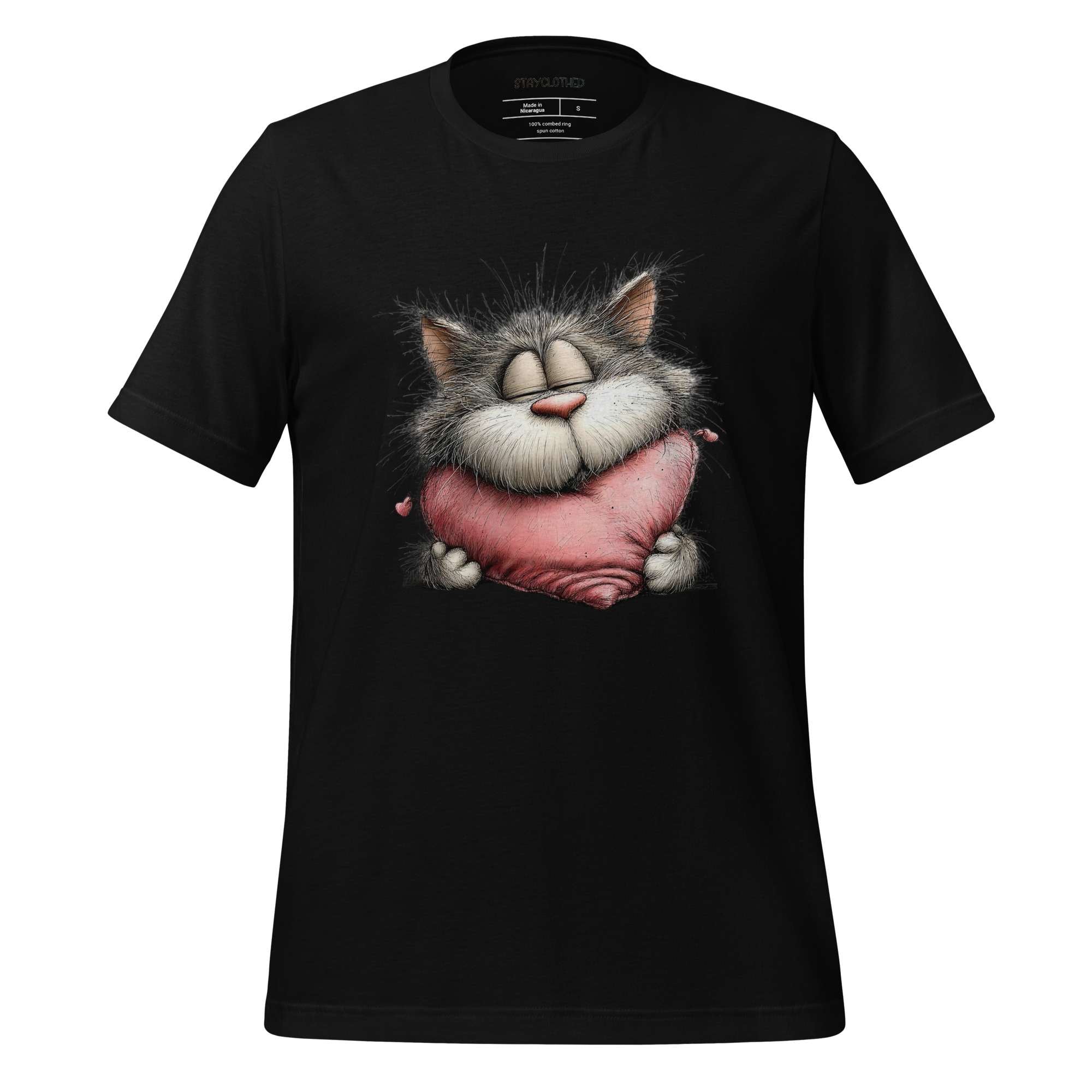 Black t-shirt with a cat holding a pink heart on a wooden surface, featuring the brand 'StayClothed'.