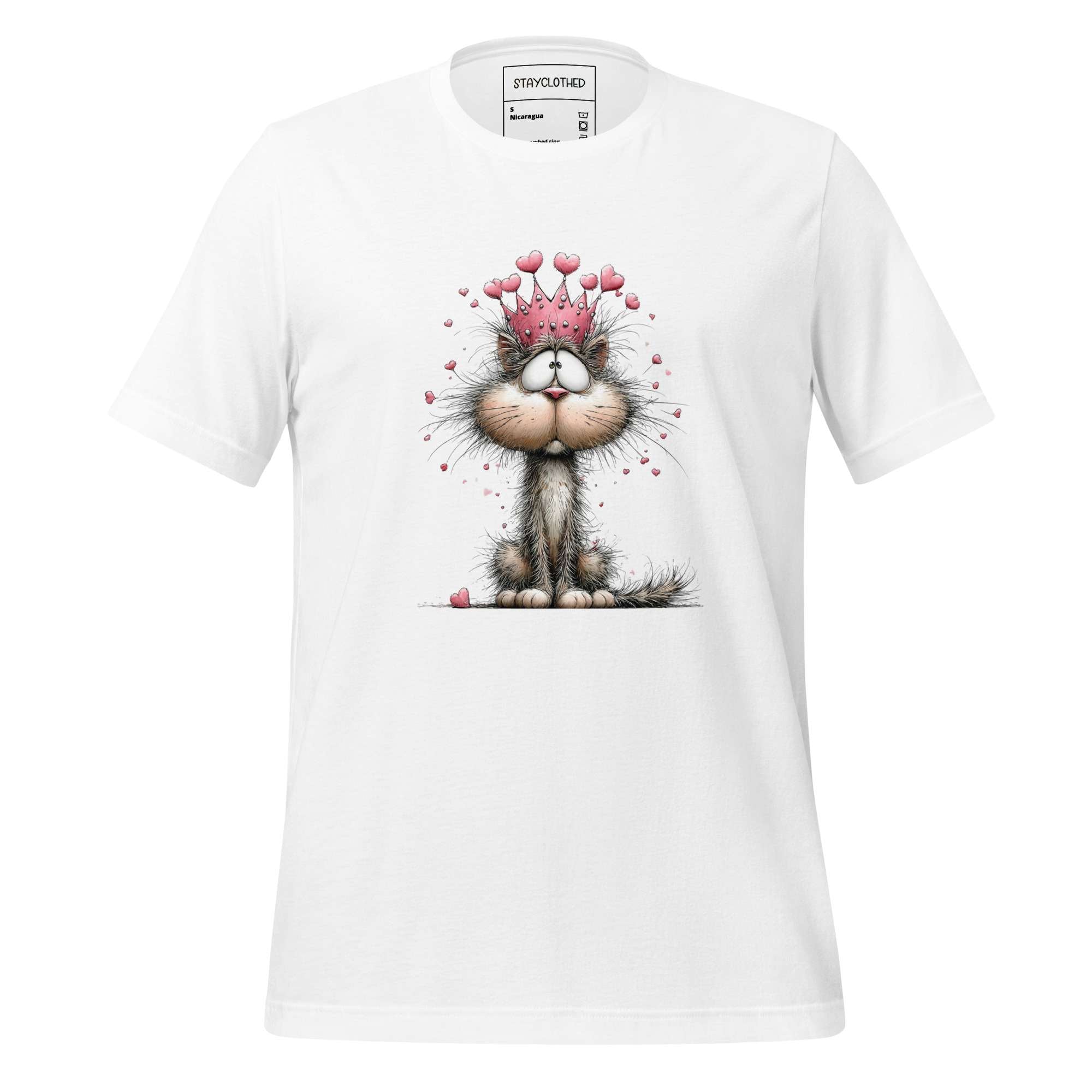 White t-shirt with a cat graphic and 'StayClothed' branding on a wooden surface.
