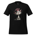 Black t-shirt with a cat graphic and 'StayClothed' branding on a wooden surface.
