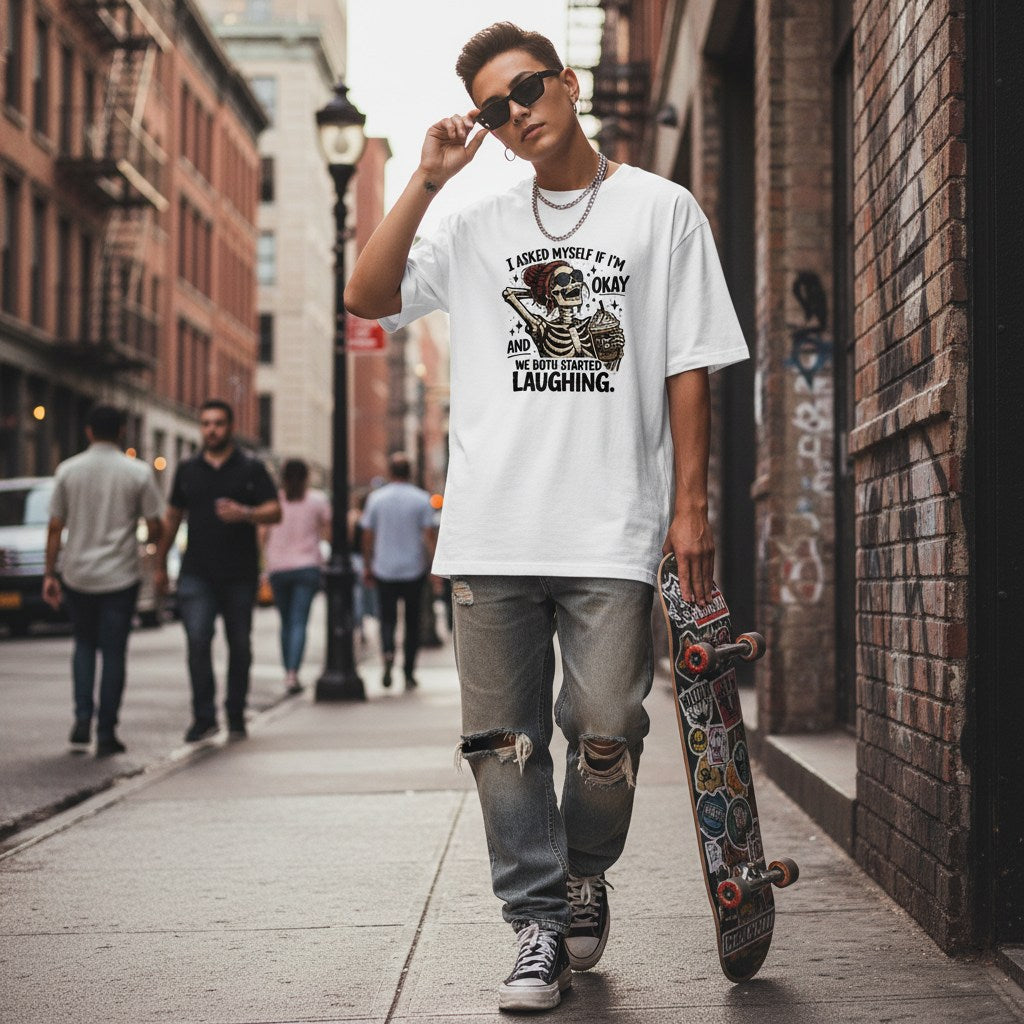 A person wearing a white I Asked Myself If I'm Okay T-Shirt walking on an urban street.