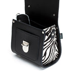 Black handbag with zebra pattern interior pocket on a white background