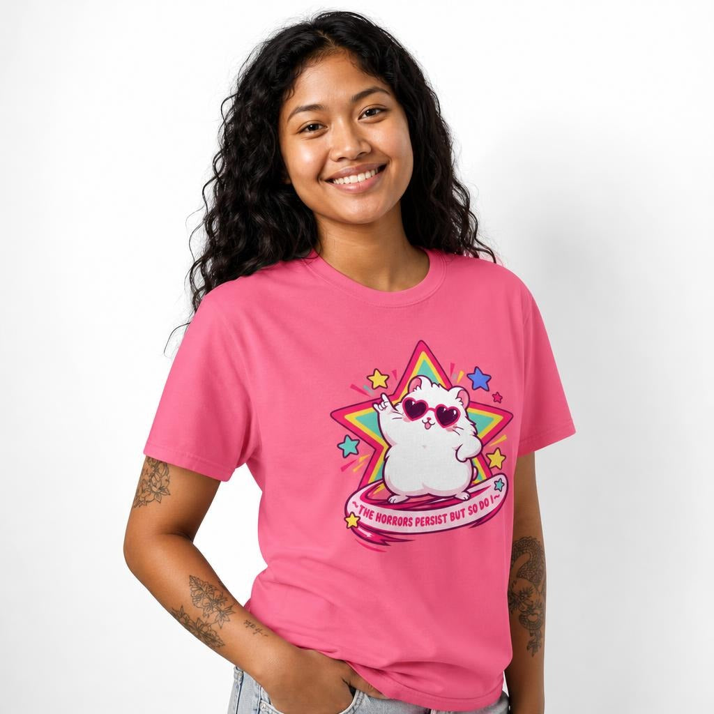 Model wearing a Crunchberry T-shirt featuring a white cat in heart-shaped sunglasses before a multicoloured star with pink lettering.