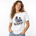 Model wearing a White T-Shirt with two cartoon pigeons in sunglasses above ‘Too coo for you’, with yellow sparkles.
