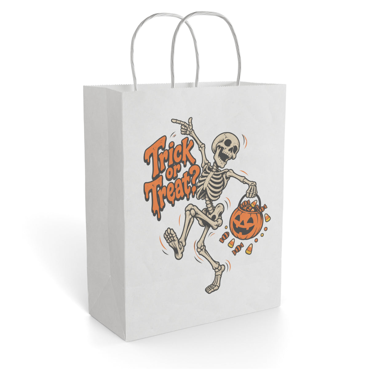 Front view of a paper gift bag with twisted handles, showing “Trick or Treat?” beside a dancing skeleton, pumpkin, and sweets.
