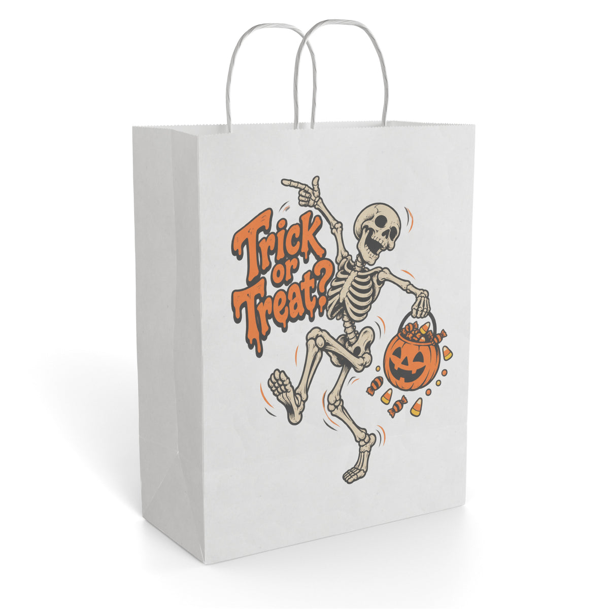 Paper gift bag with twisted handles featuring “Trick or Treat?” beside a dancing skeleton holding a pumpkin bucket, with sweets.