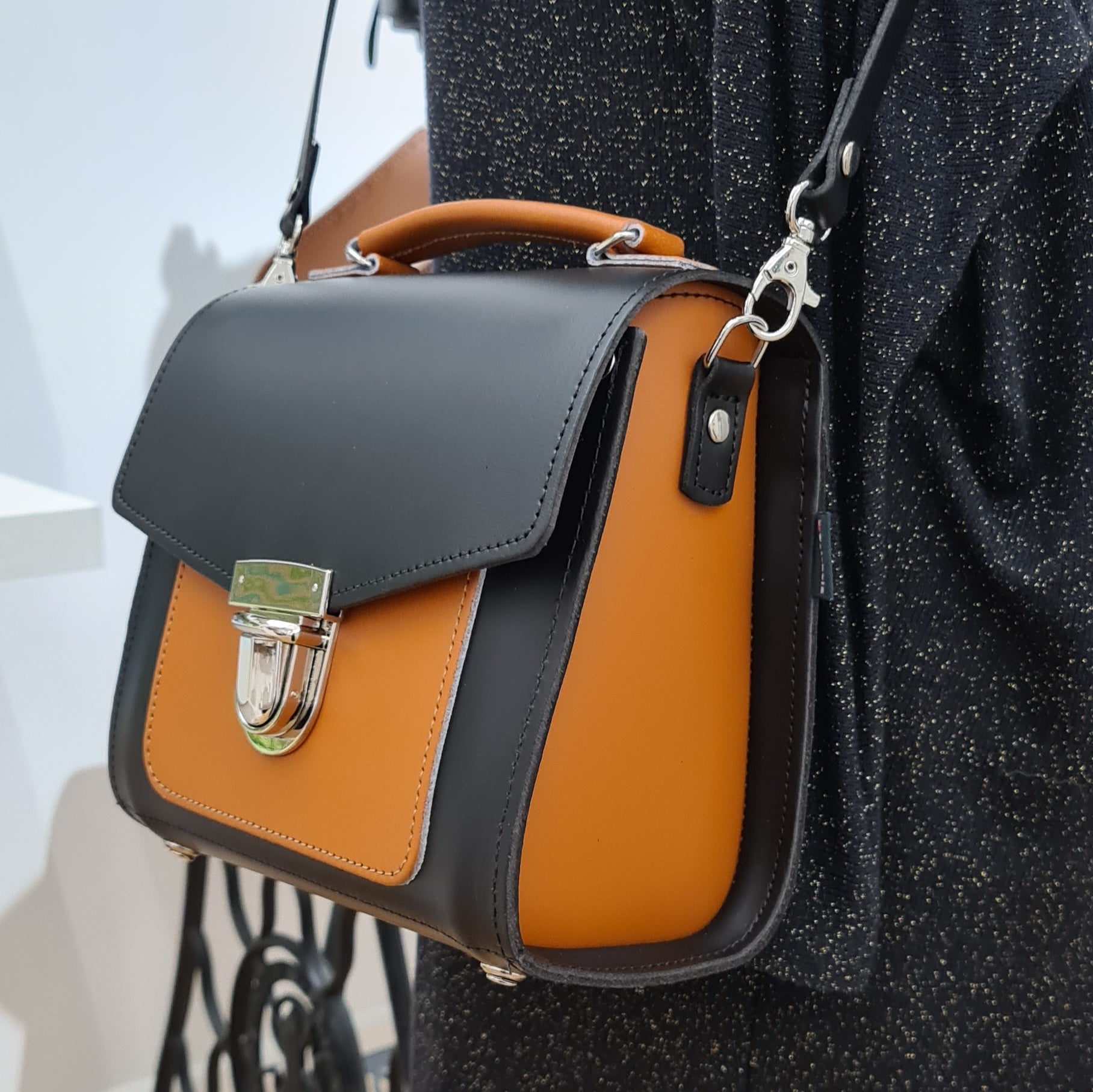 Zatchels black burnt orange Sugarcube handbag model detail