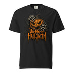 Black t shirt featuring A central orange jack-o’-lantern with an angry carved face is covered and held by skeletal hands, surrounded by twisted black vines. Distressed orange text below reads “Un-Happy Halloween”. The ar