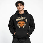 Front view of a black hoodie featuring “Un-Happy Halloween” lettering, an angry orange pumpkin, and skeletal hands.
