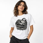 Model wearing a white T-shirt with a menacing carved pumpkin, skeletal hands, and distressed “UN-HAPPY HALLOWEEN” artwork.