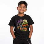 Child model wearing a black T-shirt with a grinning skeleton riding a skateboard beside a jack-o'-lantern and “UN-HAPPY HALLOWEEN” artwork.