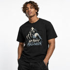 Model wearing a black T-shirt with a gothic Grim Reaper, skeletal hand, haunted castle, moon, bats, and “UNHAPPY HALLOWEEN” graphic.