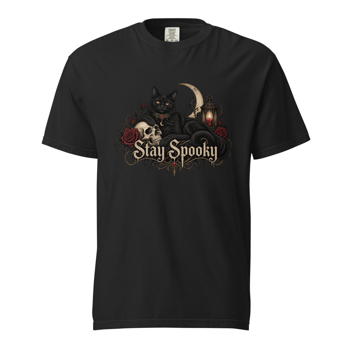 Front view of a black T-shirt featuring a black cat, skull, crescent moon, roses, lantern, and ornate “Stay Spooky” lettering.