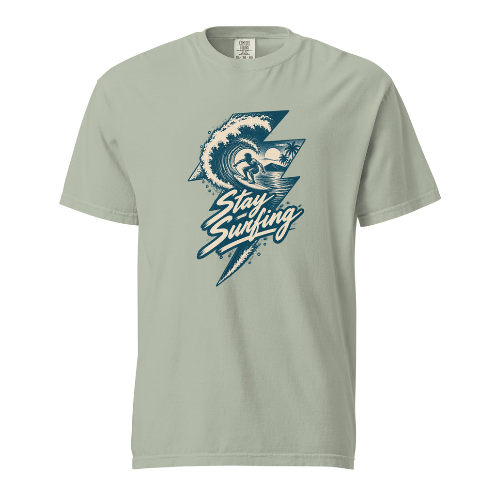 Bay T-shirt featuring a vintage hand-drawn graphic of a surfer inside a curling wave, palm trees and “Stay Surfing” lettering.