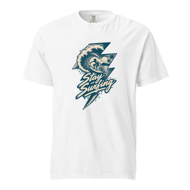 White T-shirt with a navy and cream hand-drawn curling wave, surfer and palm trees beneath “Stay Surfing” lettering