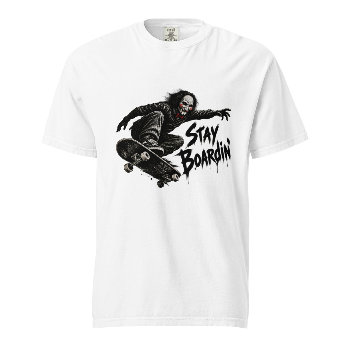White T-shirt featuring a black-and-red illustration of a masked skateboarder performing a trick on a skateboard beside “STAY BOARDIN’” lettering.