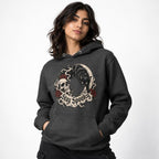 Unisex hoodie in Charcoal Heather worn by a model in an upper-body three quarter left pose on a clean white background