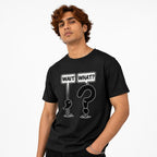 Black t shirt featuring A humorous black-and-white graphic featuring the wording “WAIT” and “WHAT?” in speech bubbles above anthropomorphised punctuation characters, including a large question mark, model view