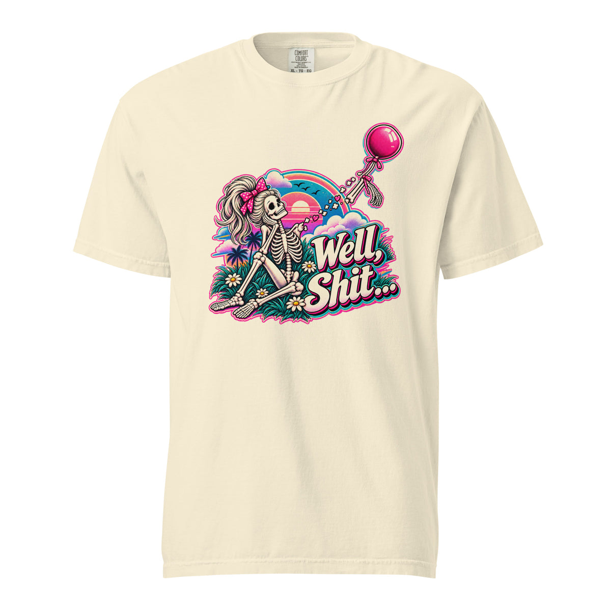 Front view of an ivory T-shirt featuring a colorful skeleton, balloon, and rainbow graphic with “Well, Shit…” lettering.