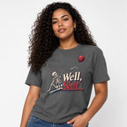 Well Shit Skeleton With Balloon t shirt in Pepper worn by a studio model in an upper-body three quarter right pose on a clean white background