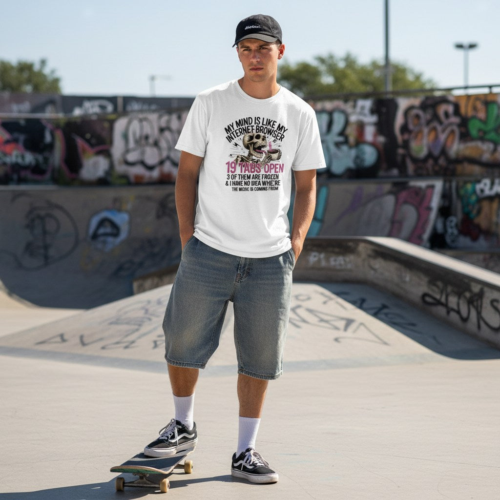 White man in streetwear standing outdoors wearing a white t-shirt