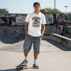 White man in streetwear standing outdoors wearing a white t-shirt